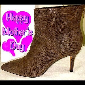 Isola side zipper heeled boots size 10M